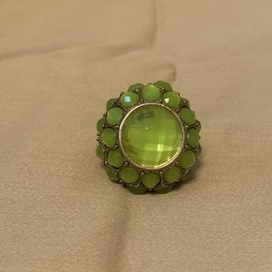 Costume ring with green stones
